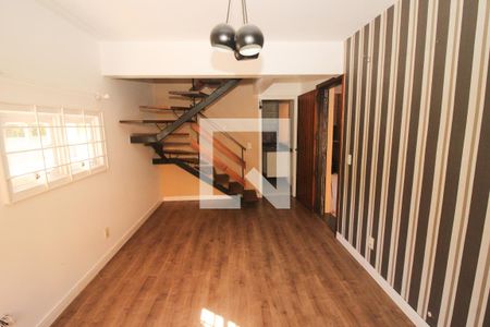 Sala de casa de condomínio à venda com 3 quartos, 165m² em Medianeira, Porto Alegre