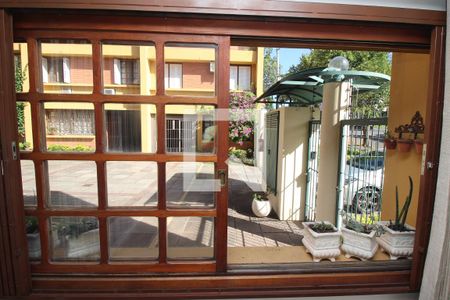Vista da Sala de casa de condomínio à venda com 3 quartos, 165m² em Medianeira, Porto Alegre