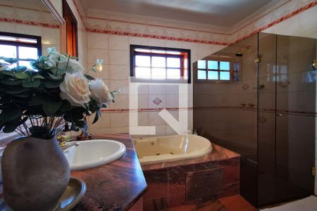 Casa de condomínio à venda com 400m², 4 quartos e 3 vagasBanheiro da Suíte 2