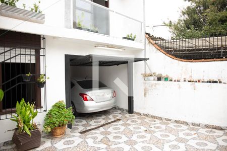 Casa à venda com 160m², 4 quartos e 2 vagas Casa à venda com 160m², 4 quartos e 2 vagasÁrea da frente/Garagem