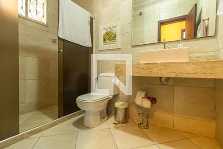 Casa de condomínio para alugar com 417m², 4 quartos e 3 vagasBanheiro Social 2