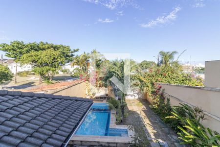 Casa de condomínio à venda com 302m², 5 quartos e 4 vagas Casa de condomínio à venda com 302m², 5 quartos e 4 vagasSuíte 1 - Varanda - Vista