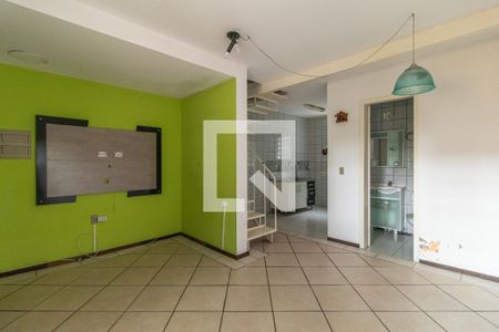 Sala de casa de condomínio à venda com 2 quartos, 120m² em Vila Nova, Porto Alegre