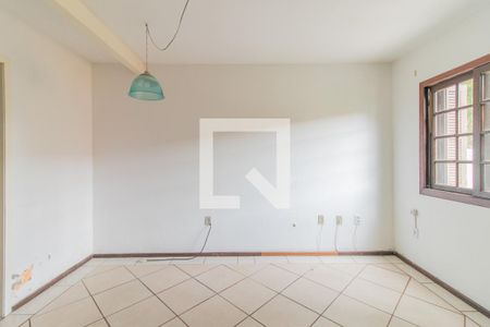 Sala de casa de condomínio à venda com 2 quartos, 120m² em Vila Nova, Porto Alegre