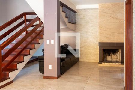 Sala com lareira de casa à venda com 3 quartos, 320m² em Rubem Berta, Porto Alegre