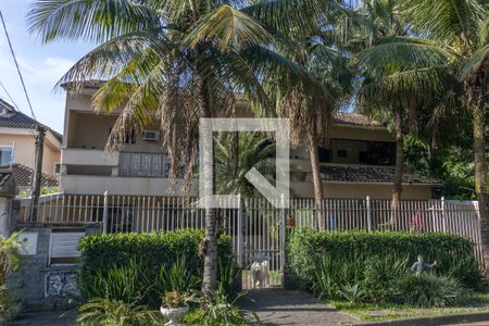 Casa de condomínio para alugar com 420m², 5 quartos e 4 vagasFachada