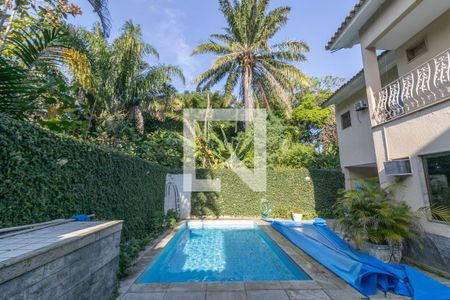 Casa de condomínio para alugar com 420m², 5 quartos e 4 vagasÁrea externa - Piscina