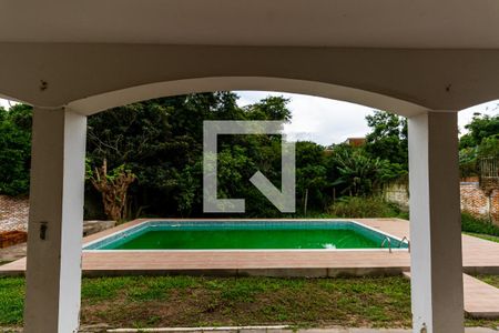 Vista sala de casa à venda com 4 quartos, 420m² em Ipanema, Porto Alegre