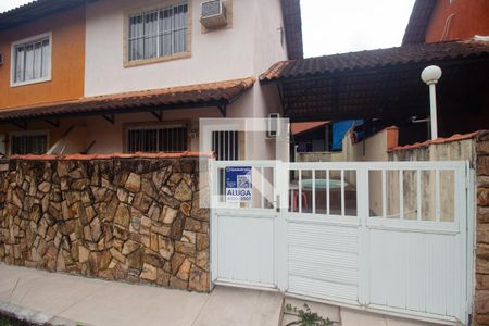 Casa de condomínio para alugar com 54m², 2 quartos e 1 vaga Casa de condomínio para alugar com 54m², 2 quartos e 1 vagaFachada