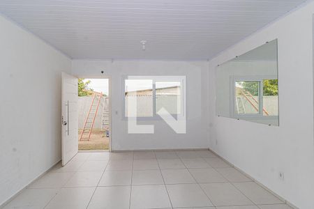 Sala de casa de condomínio para alugar com 2 quartos, 56m² em Niterói, Canoas