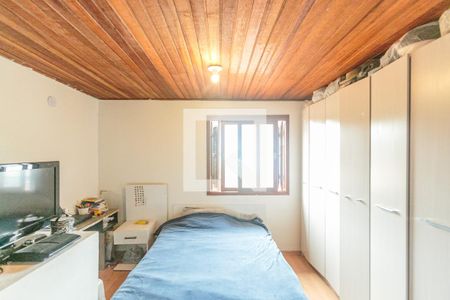Quarto de casa de condomínio à venda com 2 quartos, 65m² em Campo Novo, Porto Alegre