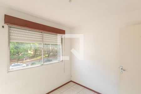 Quarto 1 de apartamento à venda com 2 quartos, 56m² em Santo Antônio, Porto Alegre