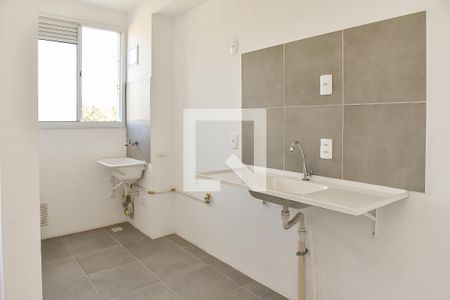 Apartamento à venda com 40m², 2 quartos e 1 vaga Apartamento à venda com 40m², 2 quartos e 1 vagaCozinha e Área de Serviço