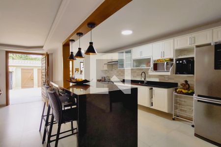 Casa de condomínio para alugar com 320m², 4 quartos e 1 vagaCozinha - Armários