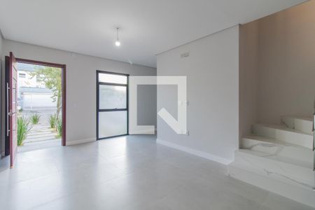 Sala de casa de condomínio à venda com 3 quartos, 129m² em Hípica, Porto Alegre