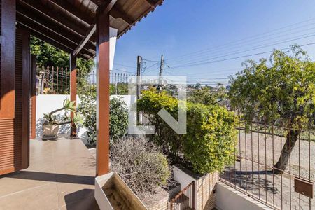 Varanda de casa à venda com 4 quartos, 228m² em Jardim Itu, Porto Alegre
