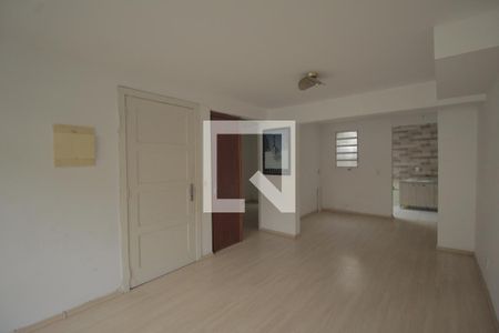 Sala de casa de condomínio à venda com 4 quartos, 107m² em Humaitá, Porto Alegre