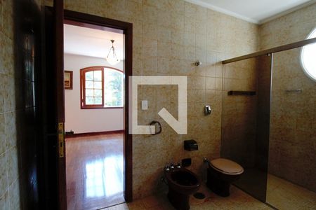 Casa à venda com 440m², 4 quartos e 3 vagasBanheiro da Suíte 1