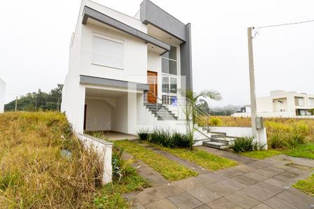 Fachada de casa à venda com 3 quartos, 165m² em Hípica, Porto Alegre