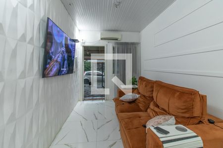 Sala de casa à venda com 2 quartos, 80m² em Campo Novo, Porto Alegre
