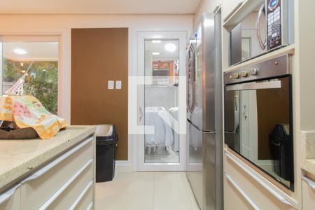 Casa de condomínio para alugar com 230m², 3 quartos e 2 vagasCozinha e Área de Serviço