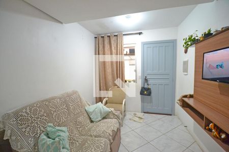 Sala de casa de condomínio à venda com 2 quartos, 50m² em Campo Novo, Porto Alegre