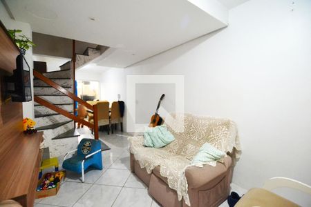 Sala de casa de condomínio à venda com 2 quartos, 50m² em Campo Novo, Porto Alegre
