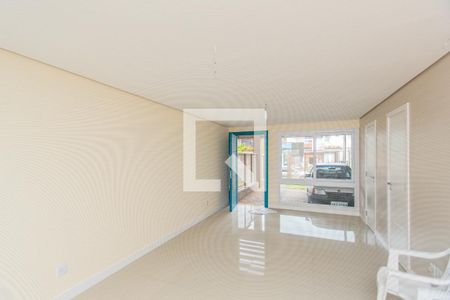 Sala de casa à venda com 3 quartos, 170m² em Guarujá, Porto Alegre