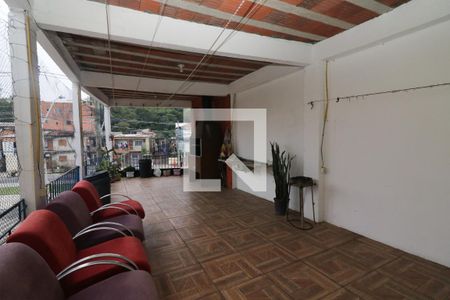 varanda de casa à venda com 4 quartos, 180m² em Santa Tereza, Porto Alegre