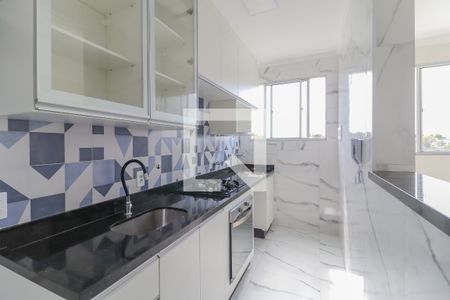 Apartamento à venda com 48m², 2 quartos e 1 vaga Apartamento à venda com 48m², 2 quartos e 1 vagaCozinha e Área de Serviço