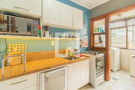 Cozinha e Área de Serviço de apartamento à venda com 2 quartos, 63m² em Azenha, Porto Alegre