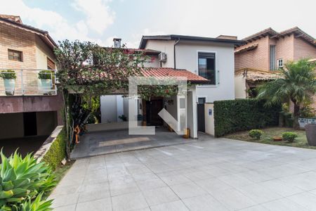 Casa de condomínio à venda com 350m², 4 quartos e 5 vagas Casa de condomínio à venda com 350m², 4 quartos e 5 vagasVista da Rua