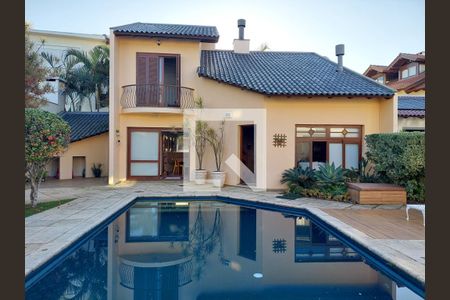 Casa à venda com 430m², 4 quartos e 4 vagas Casa à venda com 430m², 4 quartos e 4 vagasPiscina