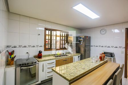 Casa à venda com 131m², 3 quartos e 3 vagas Casa à venda com 131m², 3 quartos e 3 vagasCozinha