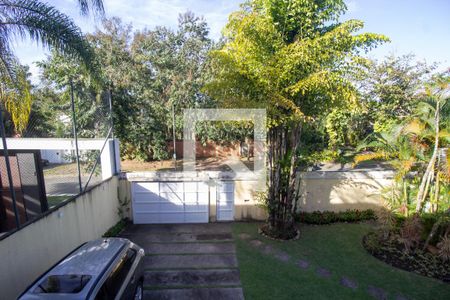 Casa de condomínio à venda com 610m², 5 quartos e 4 vagas Casa de condomínio à venda com 610m², 5 quartos e 4 vagasVista da Varanda da Suíte 1