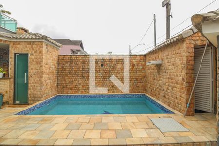 Casa de condomínio à venda com 300m², 4 quartos e 1 vagaÁrea externa - Piscina