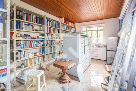 Casa à venda com 400m², 8 quartos e 6 vagas Casa à venda com 400m², 8 quartos e 6 vagasBiblioteca