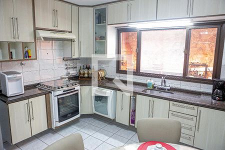 Casa à venda com 240m², 4 quartos e 4 vagas Casa à venda com 240m², 4 quartos e 4 vagasCozinha