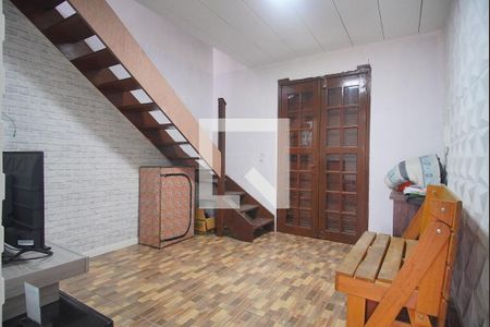Sala de casa de condomínio à venda com 2 quartos, 60m² em Vicentina, São Leopoldo