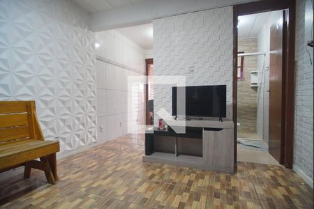 Sala de casa de condomínio à venda com 2 quartos, 60m² em Vicentina, São Leopoldo
