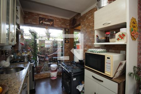 Cozinha de casa de condomínio à venda com 2 quartos, 118m² em Niterói, Canoas