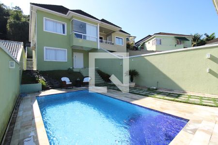 Casa de condomínio à venda com 240m², 3 quartos e 2 vagasÁrea Externa Frente