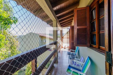 Varanda de casa à venda com 3 quartos, 200m² em Vila Nova, Porto Alegre