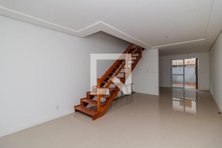 Sala de casa à venda com 3 quartos, 91m² em Guarujá, Porto Alegre
