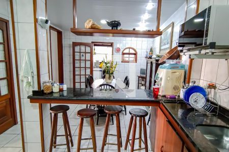 Casa de condomínio à venda com 290m², 4 quartos e 2 vagasCozinha