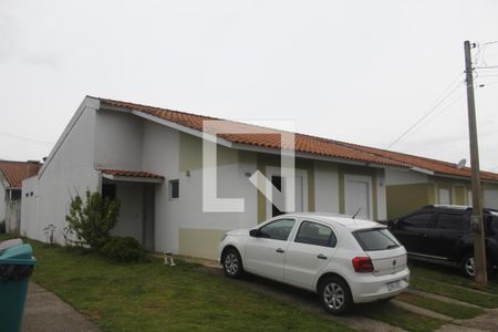 Fachada de casa de condomínio para alugar com 2 quartos, 51m² em Terra Nova, Viamão