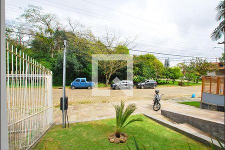 Vista de casa à venda com 4 quartos, 312m² em Espírito Santo, Porto Alegre