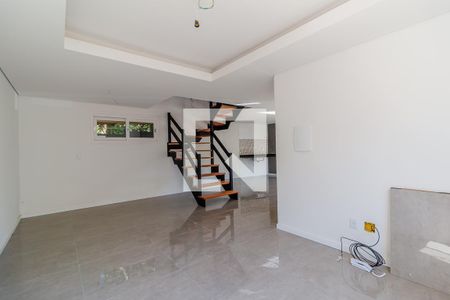 Sala de casa de condomínio à venda com 3 quartos, 240m² em Vila Nova, Porto Alegre