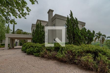 Casa de condomínio à venda com 620m², 5 quartos e 10 vagasFachada 