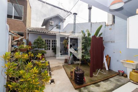 Sala/Cozinha-Vista de casa à venda com 3 quartos, 90m² em Olaria, Canoas